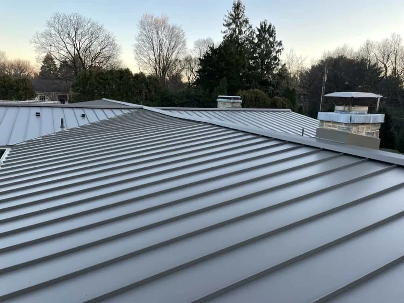 Wide close-up of finished standing-seam roof panels