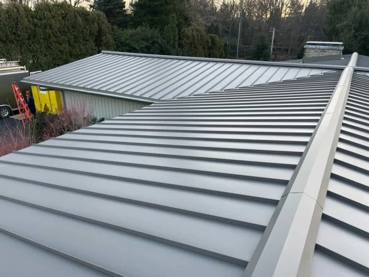 Finished roof panels and intersecting ridge lines