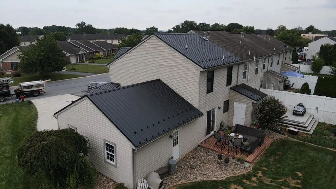 Aerial view of completed roofs on attached homes