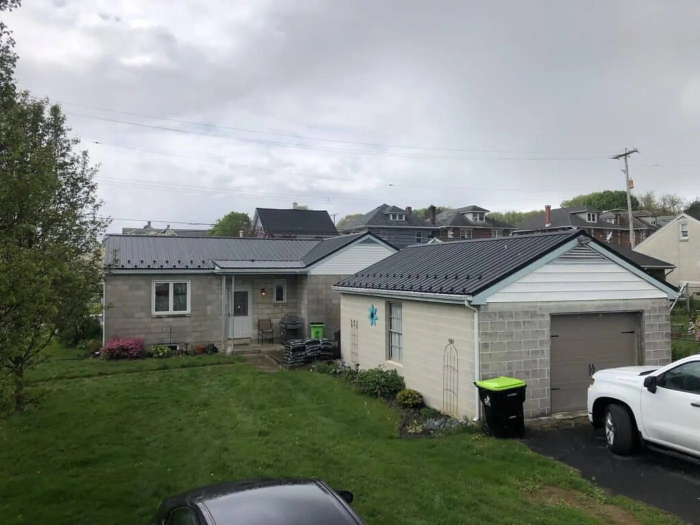 Aerial view of a dark roof on a single-story home
